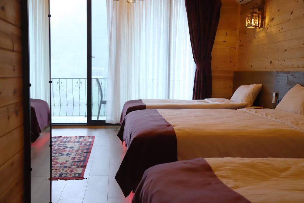 Slope, Standard, Quadruple, Double and Twin Beds, River View