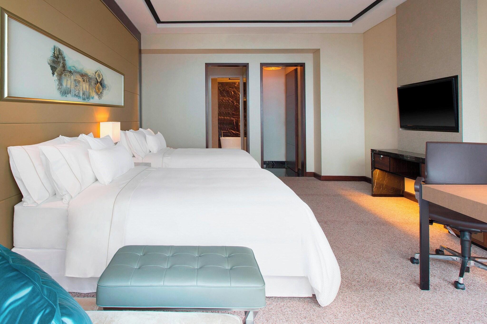 غرفة ديلوكس رباعية بسريرين مزدوجين، The Westin Singapore 3/4