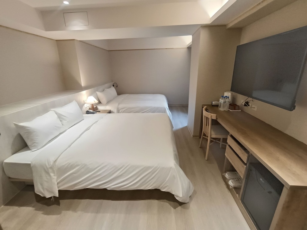 غرفة كلاسيكية رباعية بسريرين كينج، Jing Jing Holiday Hotel 5/7