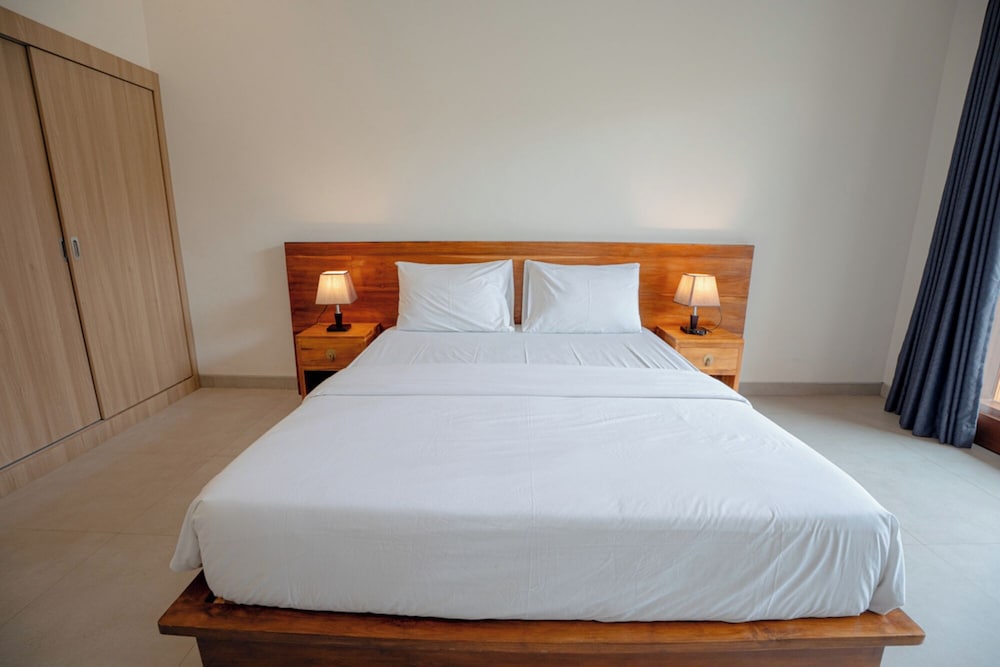 غرفة ديلوكس بسرير كوين، Abimanyu Guest House 1/8