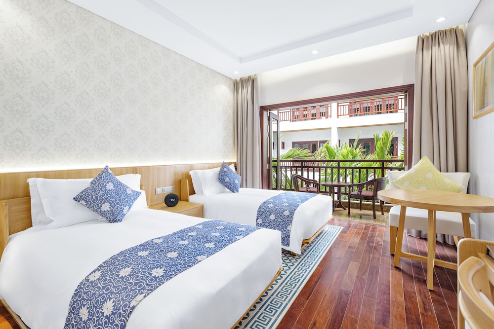 Faifo Twin with Garden View، Wafaifo Resort Hoi An 2/6