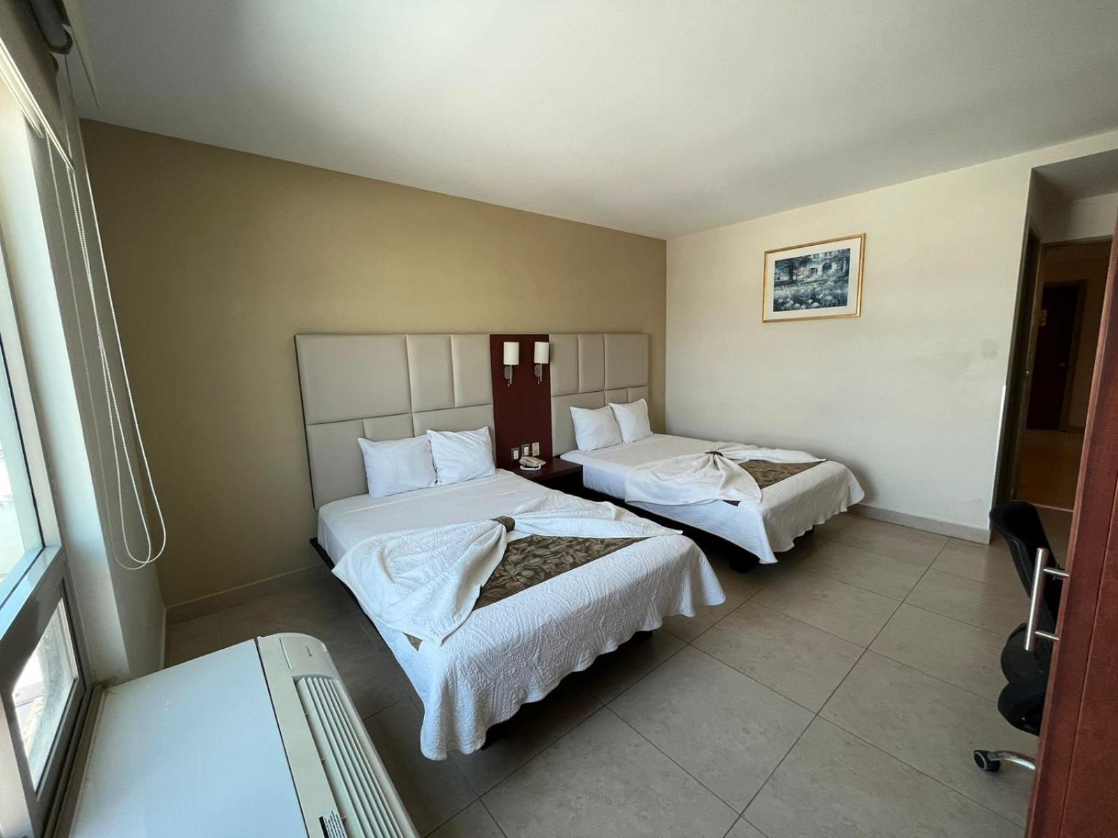 غرفة بسرير مزدوج بإطلالة على البحر، Av Inn Hotel 3/7