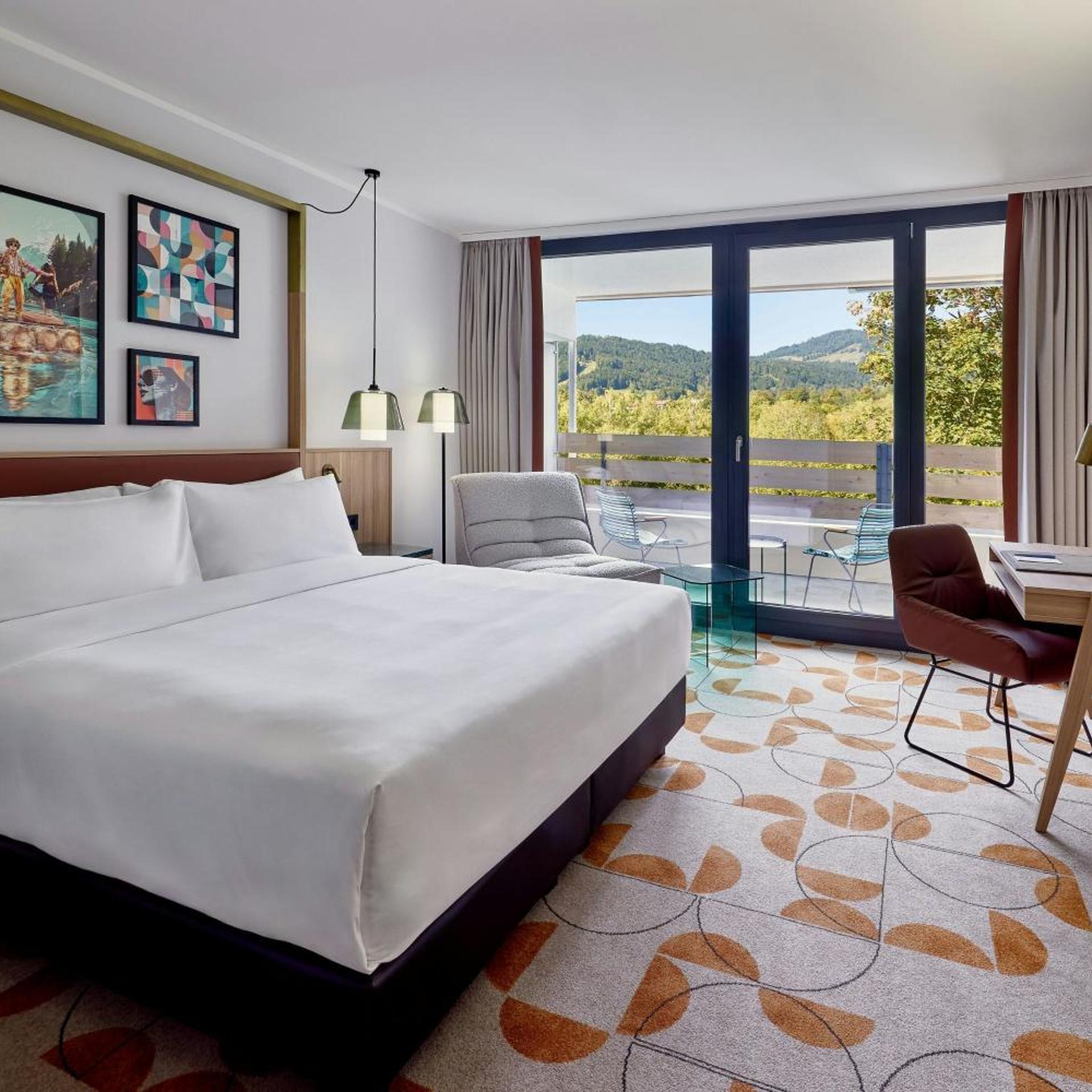 1 Bedroom, Suite, King Bed, Garden View, Sofa, 2 Balconies