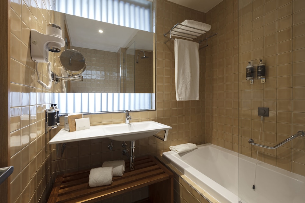 جناح دوبلكس سوبيريور بسرير كينج مع أريكة، NEYA Porto Hotel 6/6