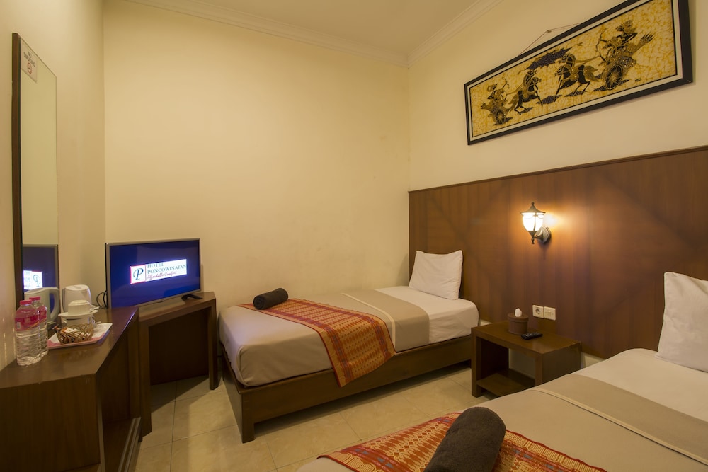 Hotel Poncowinatan - Tugu 12/21