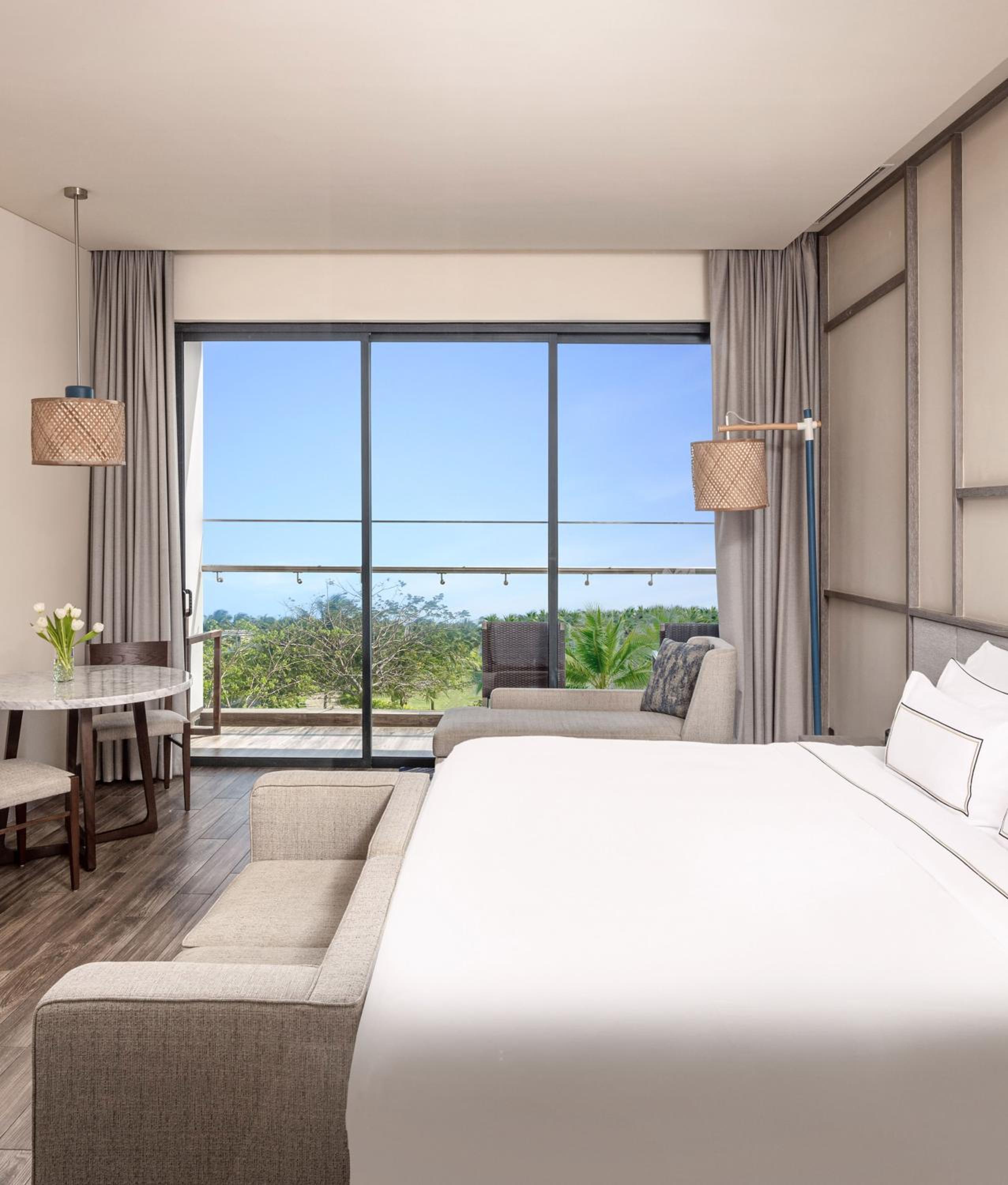 غرفة ديلوكس بسرير مزدوج أو سريرين منفصلين بإطلالة على الحديقة بشرفة، Melia Ho Tram Beach Resort 3/4