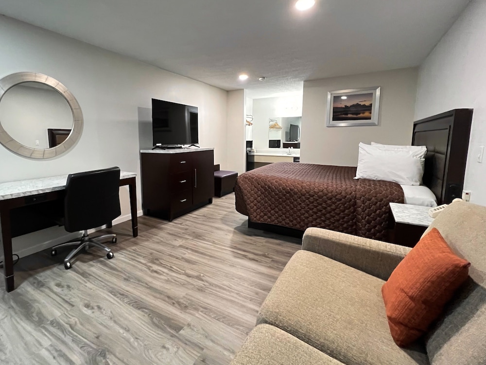 Garden Inn & Suites 36/53