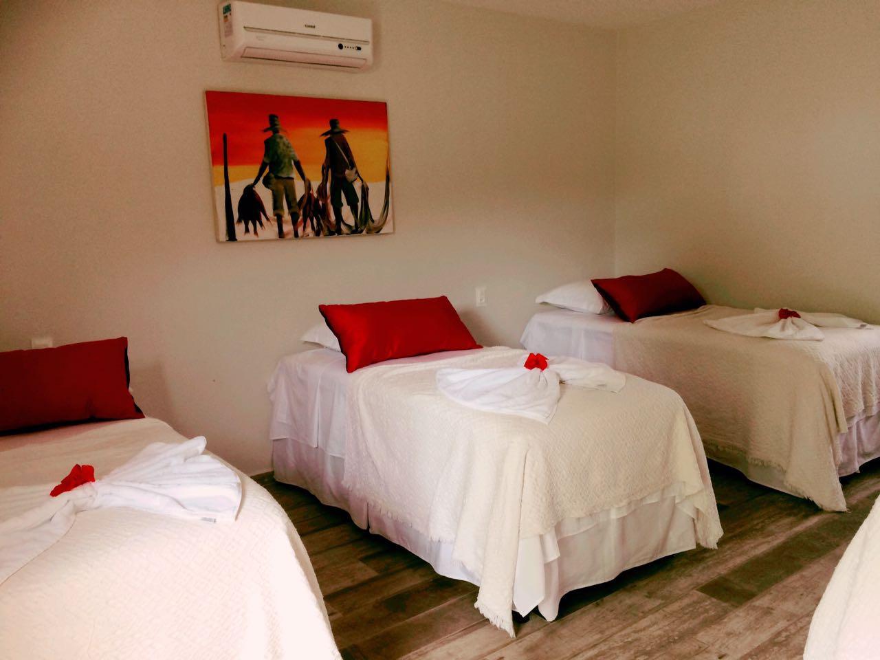 غرفة رباعية بإطلالة على الحديقة، Pousada Waikiki 2/6