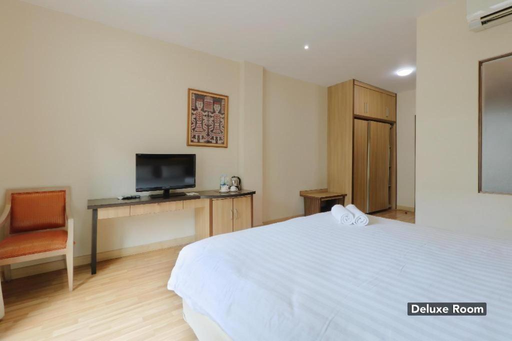 غرفة ديلوكس، Oyo 128 Mutiara Suites 4/6