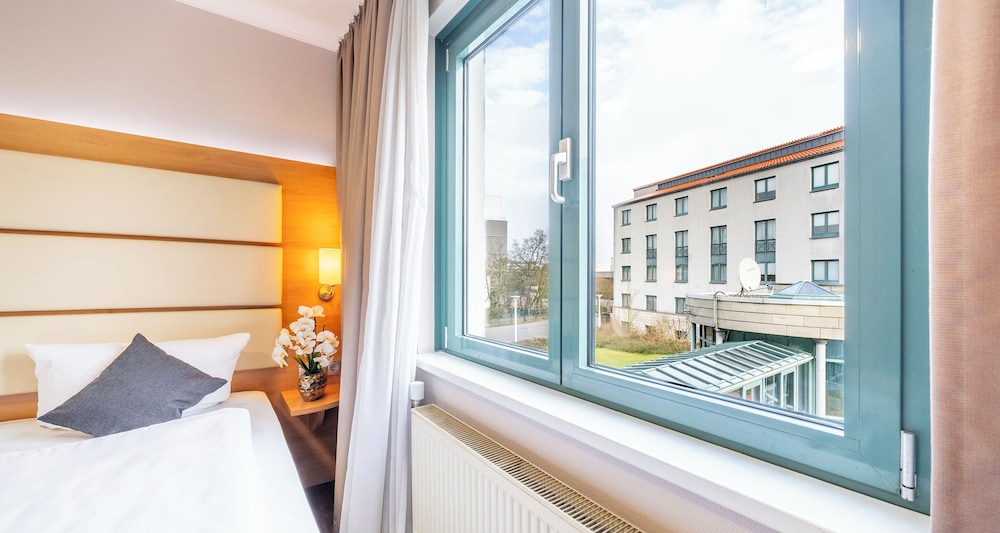 غرفة كومفورت بسرير كينج، PLAZA INN Braunschweig City Sud 2/3