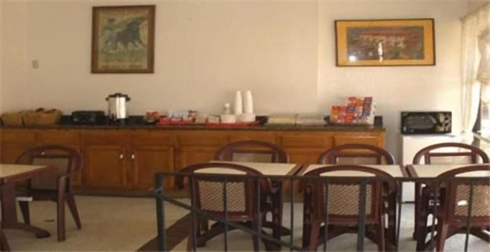 Garden Inn Suites 39/55