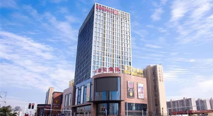 Echarm Hotel Xiantao Yuantai Weilaicheng، Xiantao 6/47