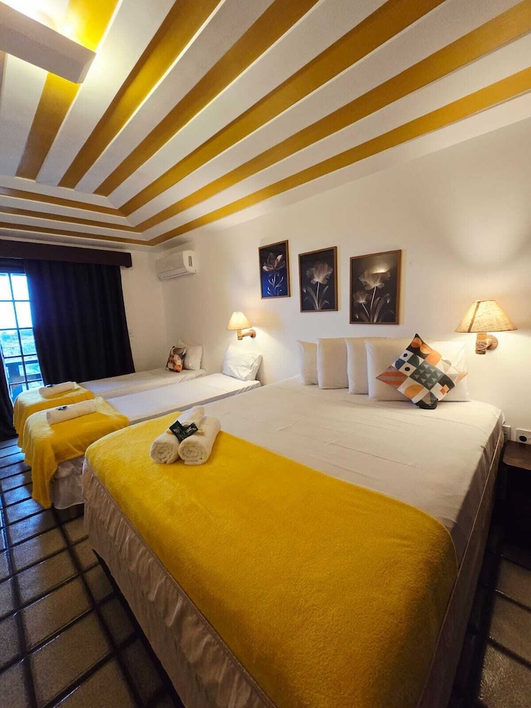 Deluxe, Family, 1 Double and 3 Single Beds, Sea View, Patio