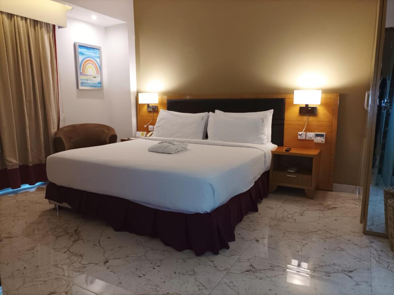 جناح بغرفة نوم واحدة مع أريكة