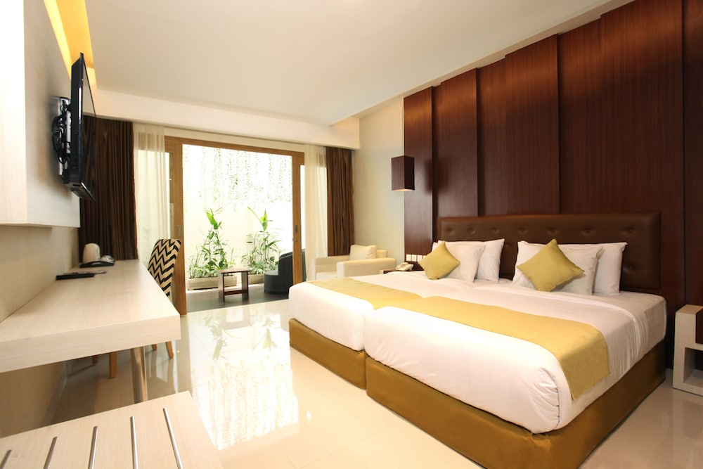 غرفة ديلوكس بسرير كينج، Tonys Villas and Resort Seminyak Bali 3/8