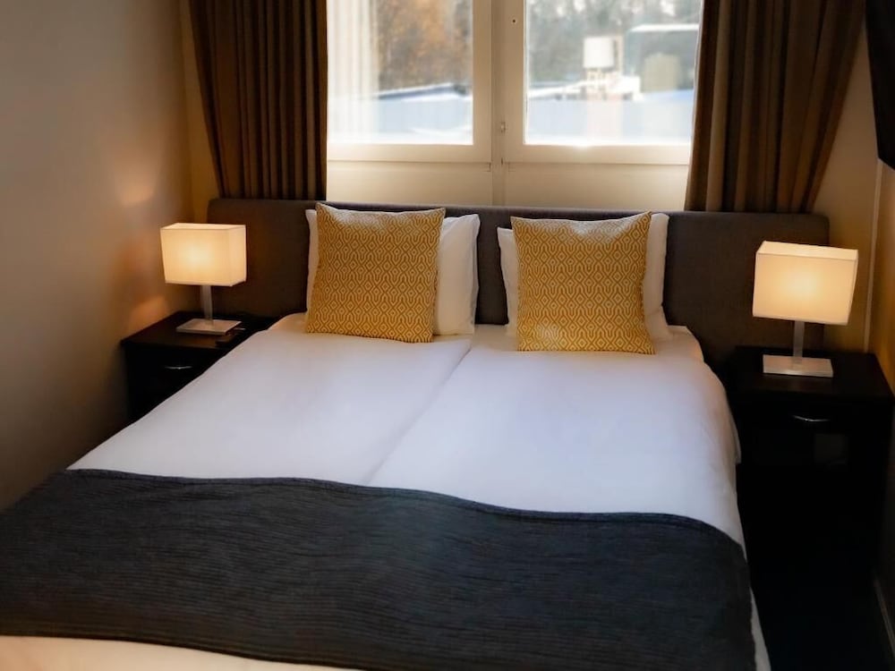 غرفة اقتصادية بسرير كوين، Mariestads Stadshotell 2/6