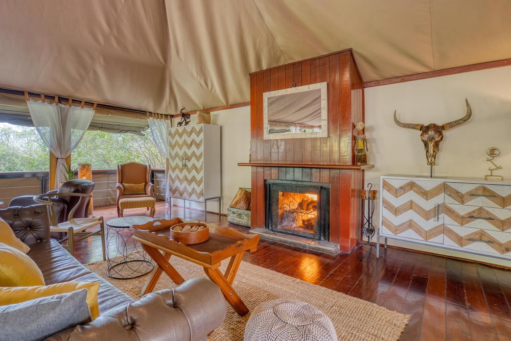 OLARE MARA KEMPINSKI MASAI MARA 34/50