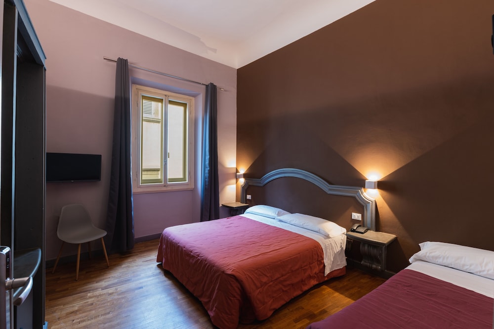 غرفة ثلاثية بسرير مزدوج وسرير فردي، Hotel Unicorno 2/6