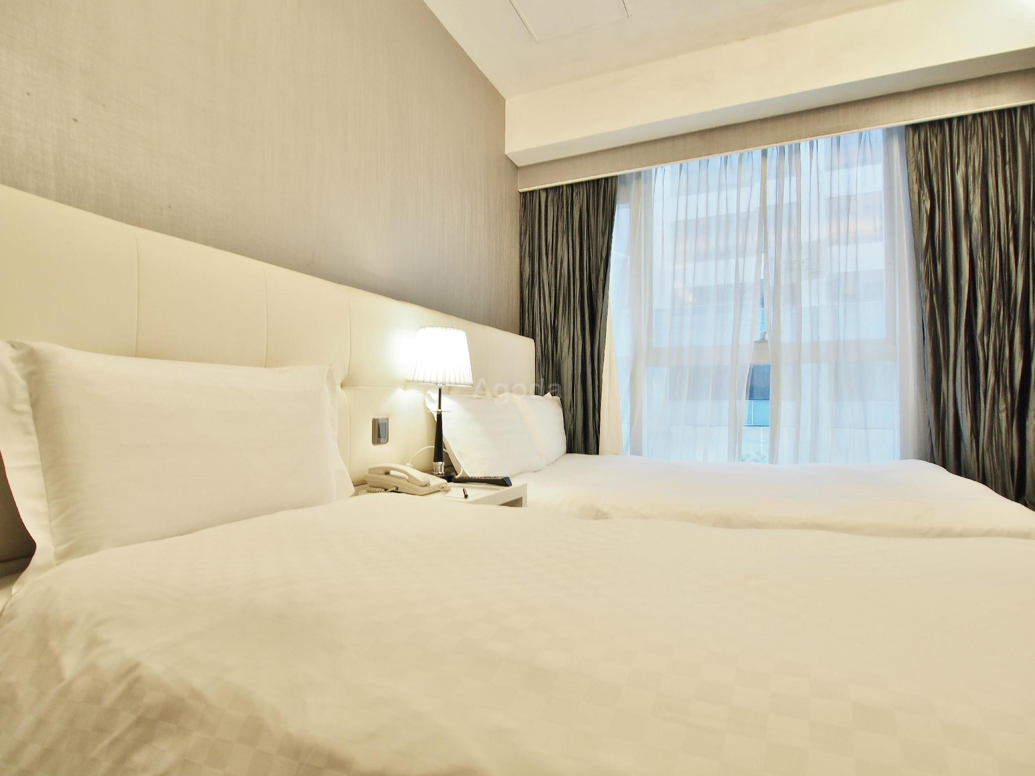 Deluxe, Triple, 1 Double and 1 Single Bed