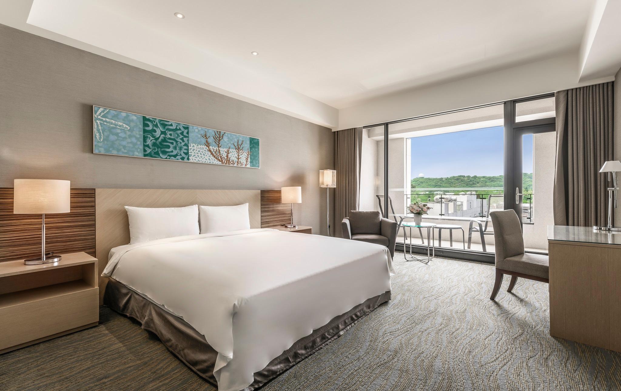 غرفة ديلوكس بسرير كينج وسرير كوين، Lakeshore Hotel Hualien 2/2