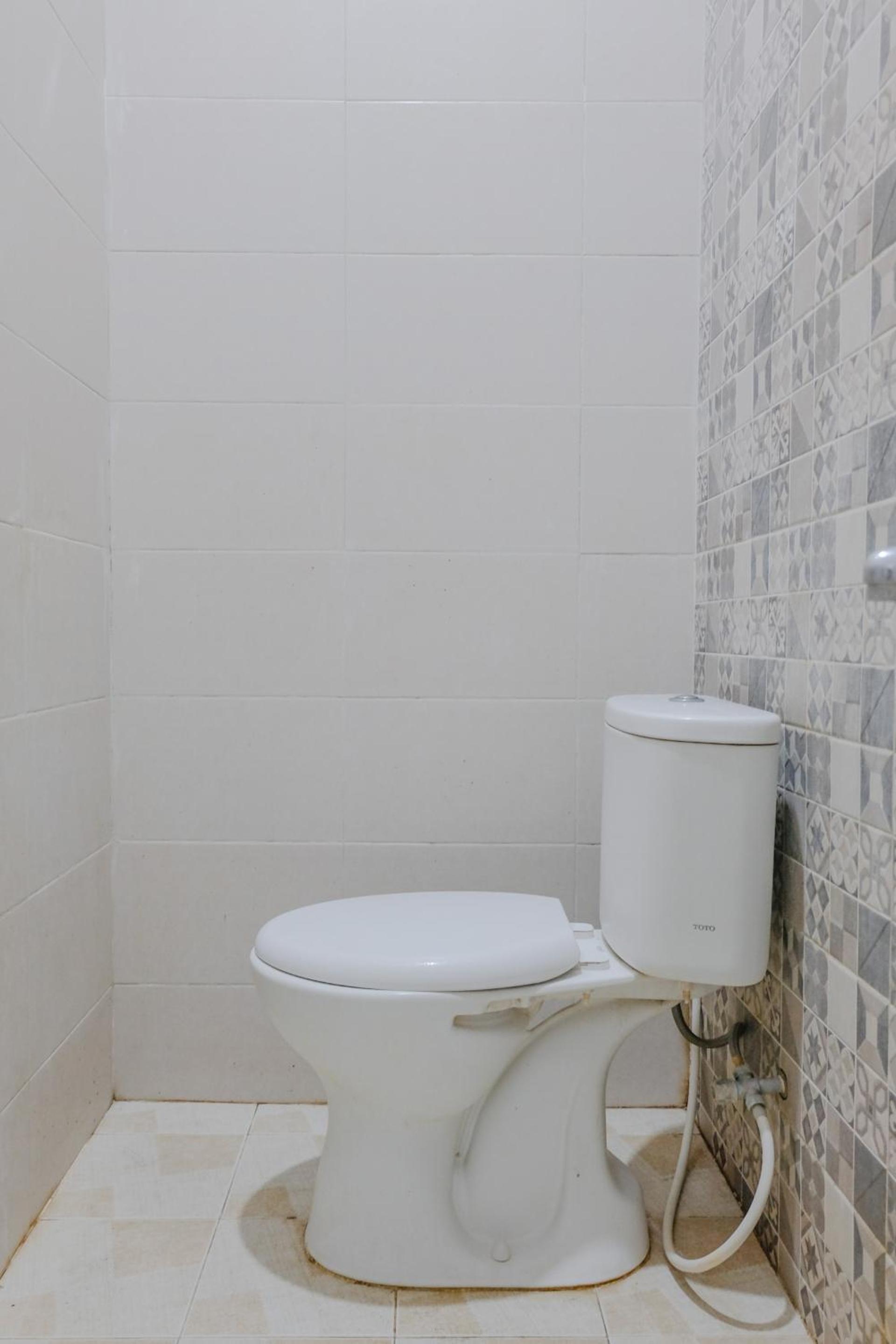 OYO 1038 Embun Pagi Syariah Residence 49/50