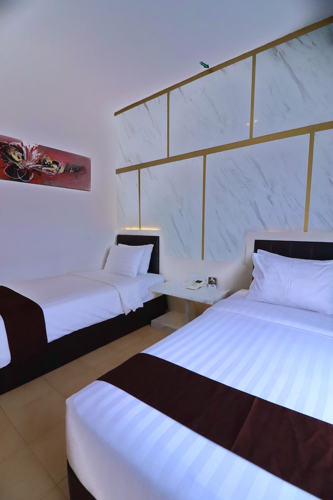 غرفة سوبيريور بسريرين منفصلين، Grand Malioboro Yogyakarta Hotel 2/4