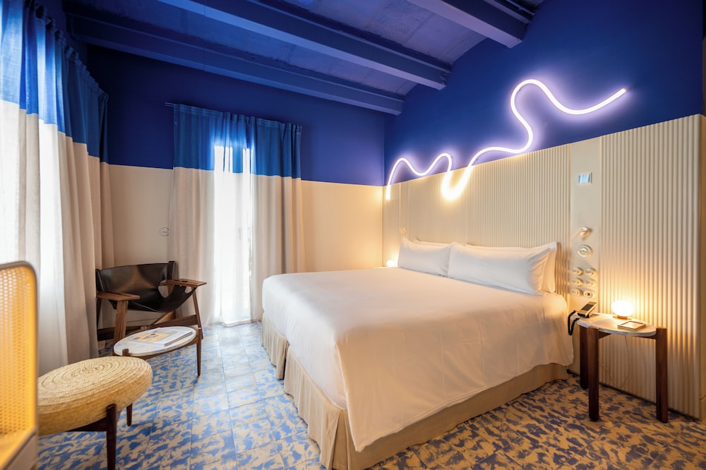 جناح جونيور بسرير كينج بشرفة، Terreno Barrio Hotel 5/10