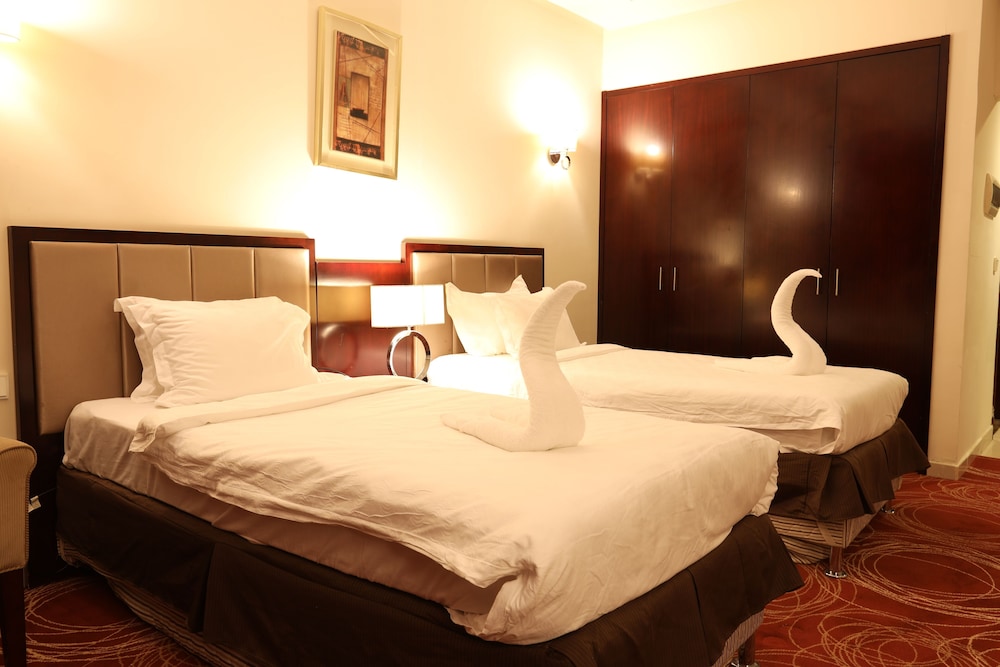 غرفة قياسية بسريرين منفصلين وسرير كينج، ابراج الريان المكية(Al Rayyan Makiya Towers Hotel) 2/10
