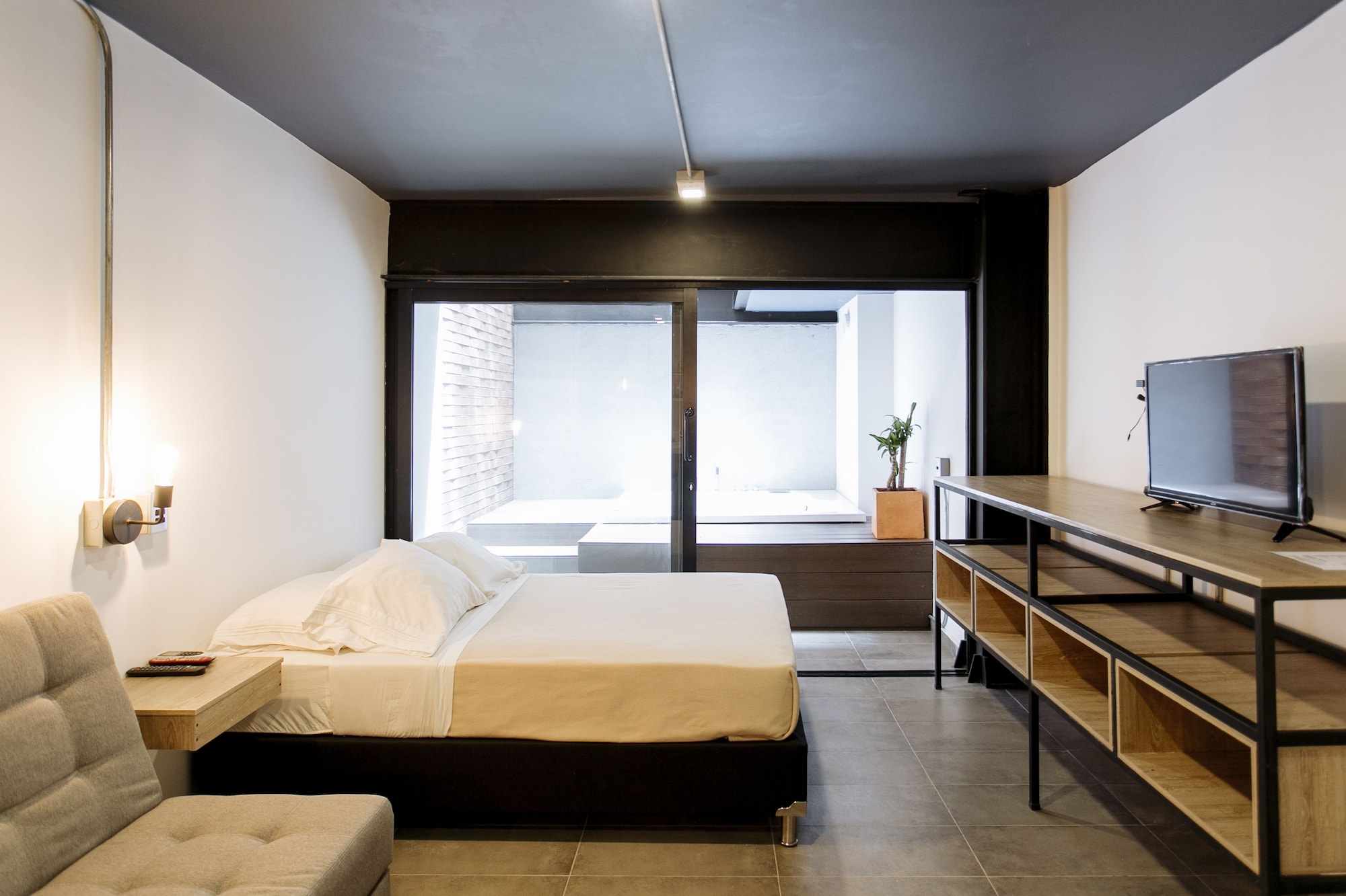 لوفت بسرير مزدوج مع أريكة بجاكوزي، Soy Local Housetel 3/8