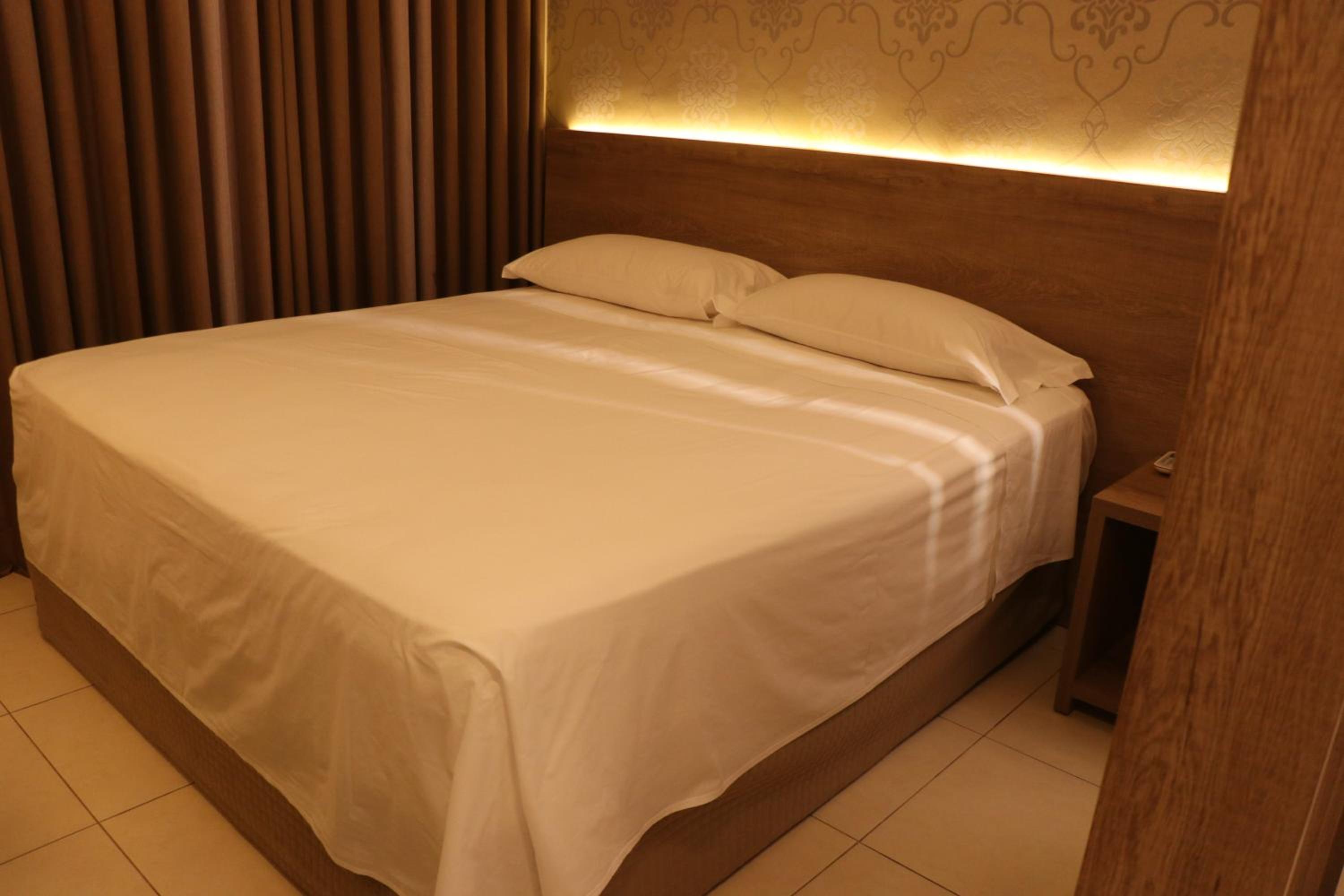 غرفة ديلوكس ثلاثية بسرير كينج وسرير فردي