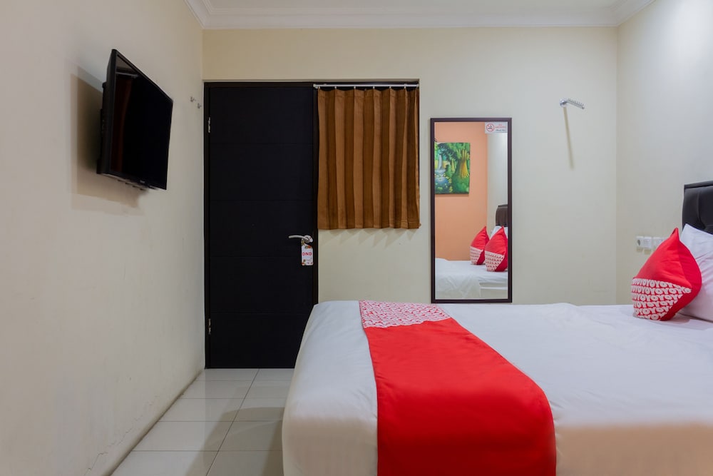 Oyo 989 Audah Guesthouse Syariah 13/36