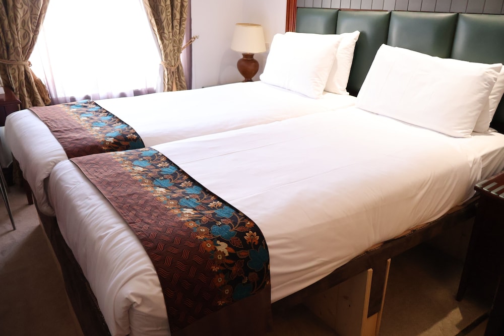 DELUXE, TWIN BEDS