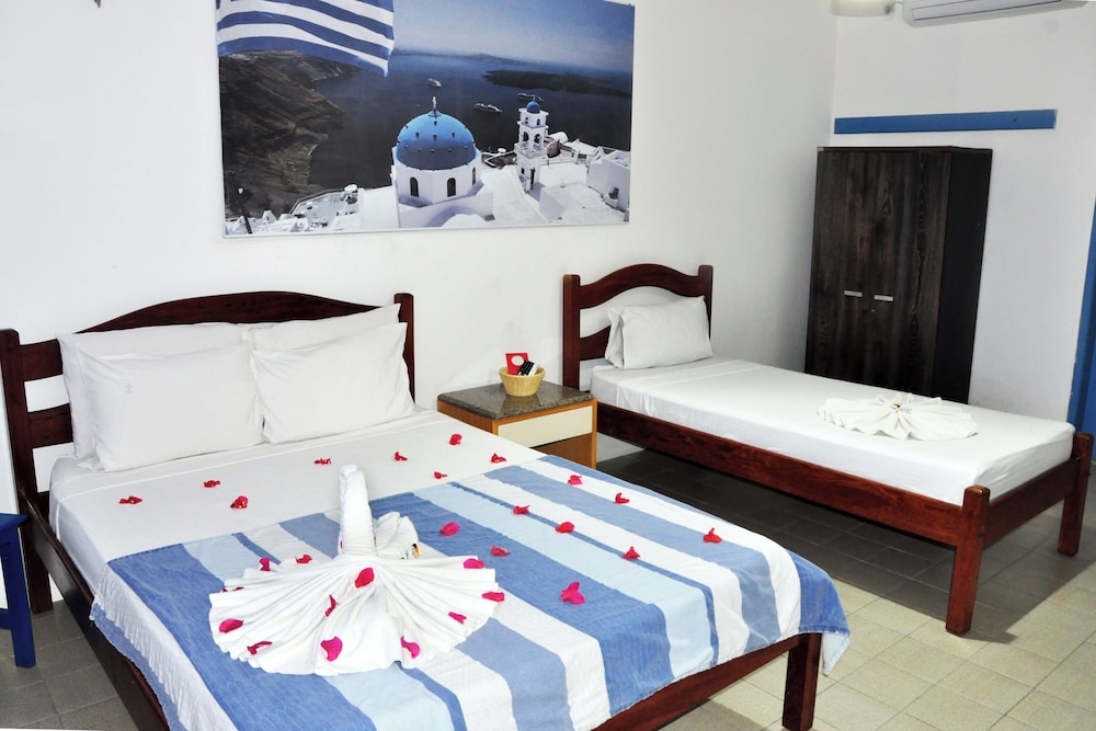Master, Suite, Triple, 1 Double and 1 Single Bed، La Suite Praia 9/10