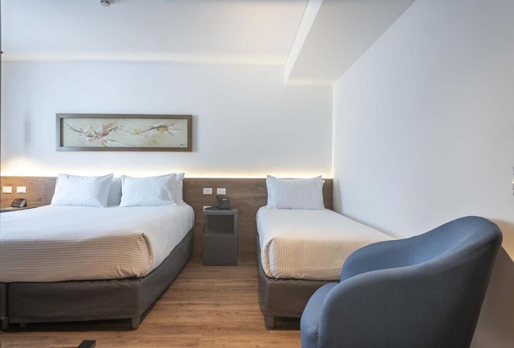 Standard, 1 King and 1 Single Beds