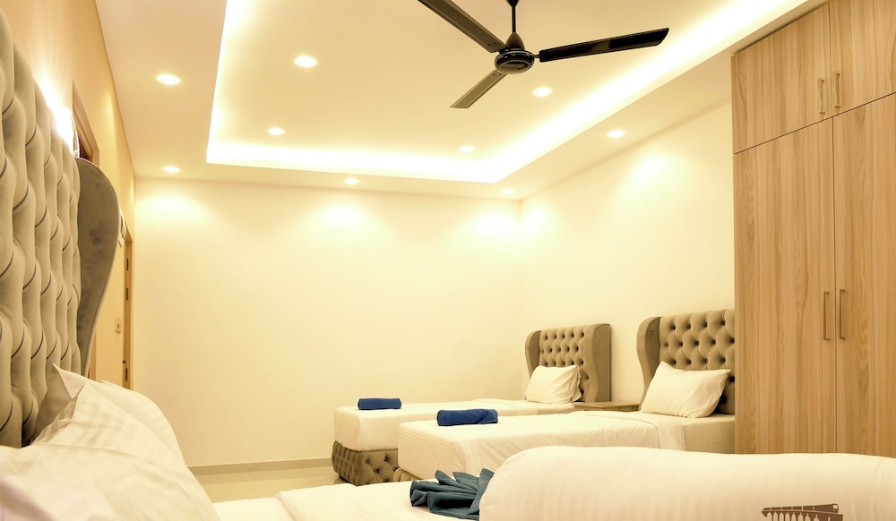 غرفة ملكية رباعية بسرير كينج، Nine Arch Holiday Resort 6/10