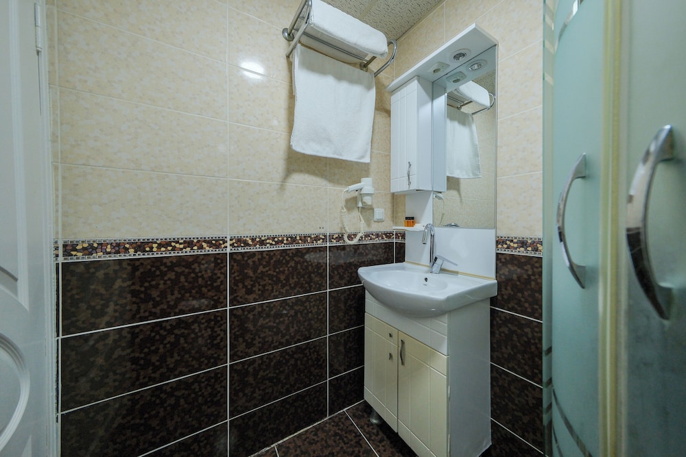 غرفة مفردة، Grand Hotel Palmiye 9/12