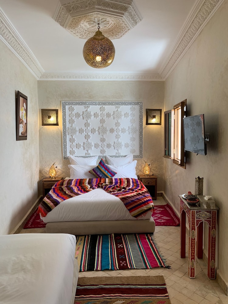 Suite, 1 Queen and 3 Single Beds