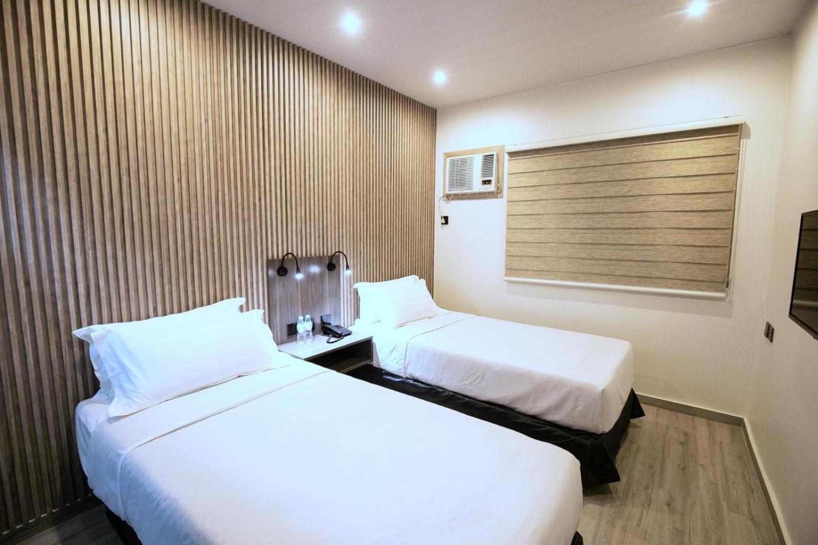 DELUXE, TWIN BEDS