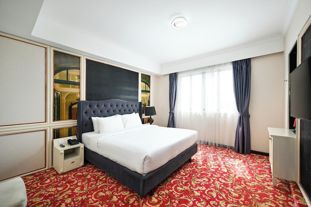 غرفة جونيور بسرير كينج بإطلالة على المدينة، California Saigon Hotel & Rooftop Pool 2/5