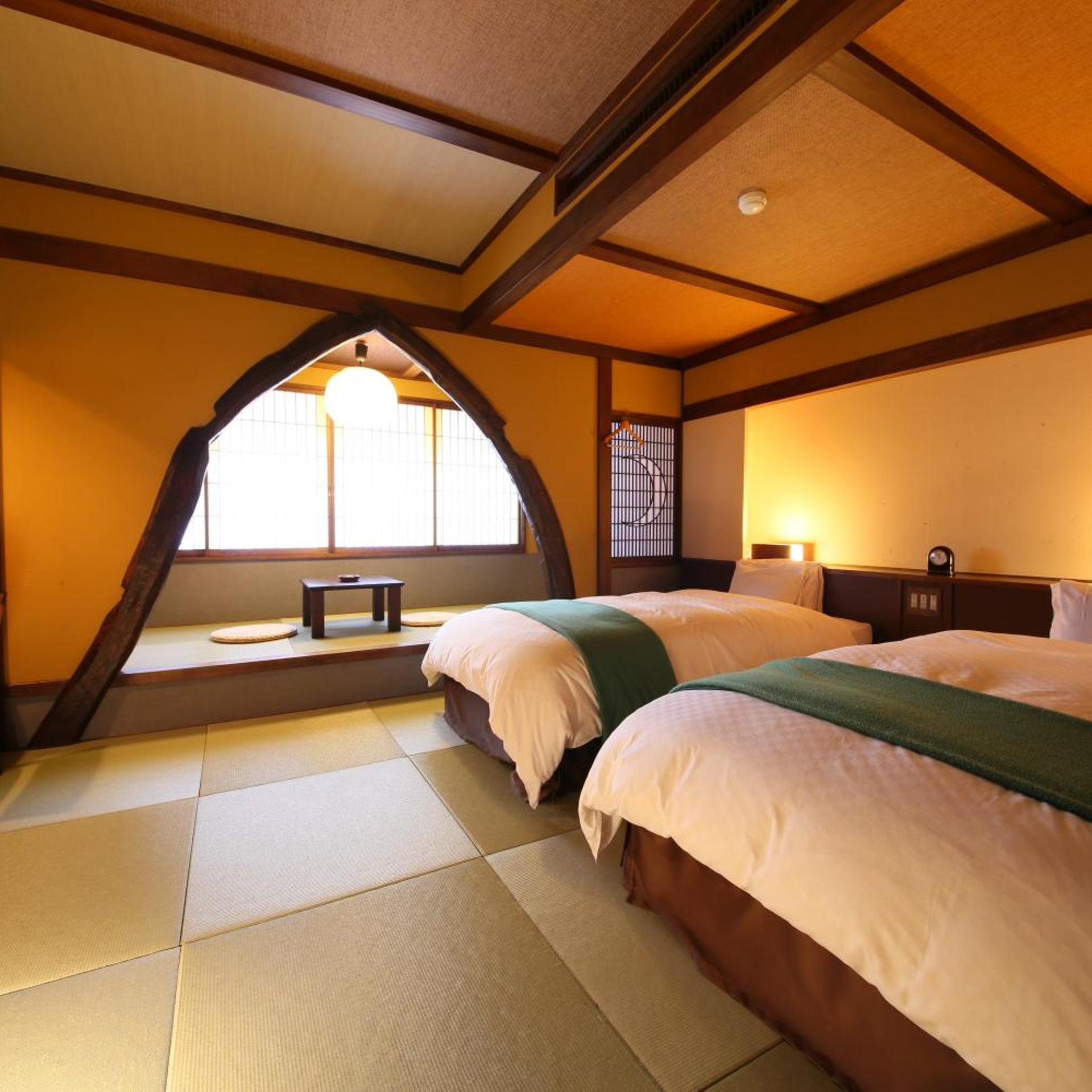 غرفة بسريرين منفصلين بأرضية تاتامي، Hotel Tamanoyu 10/10