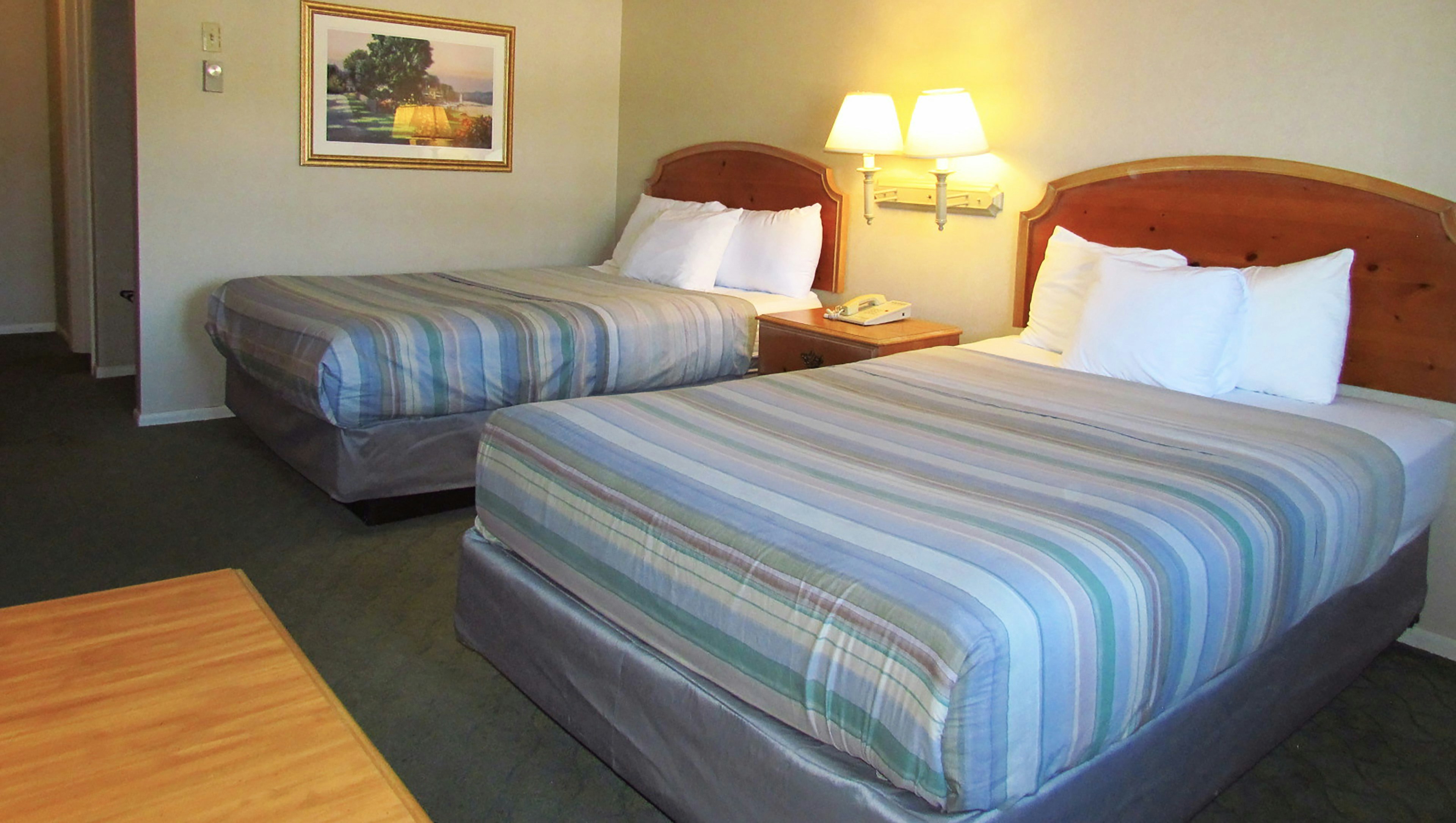 Magnuson Grand Pioneer Inn And Suites 13/48