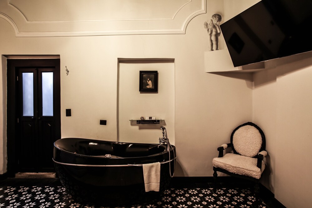 Quinta Esencia Hotel Boutique 65/77