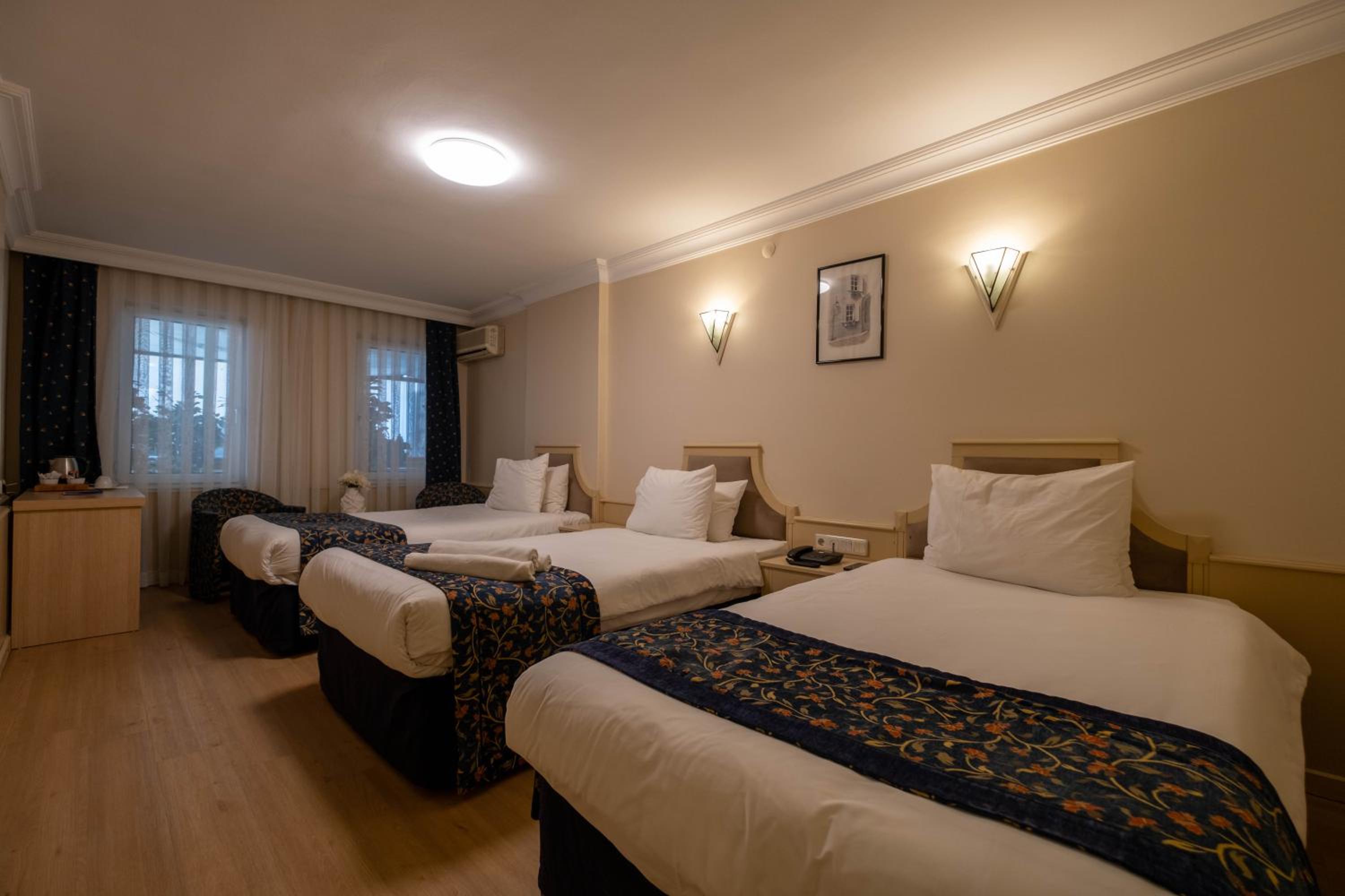 غرفة اقتصادية ثلاثية، Berr Hotel 2/9
