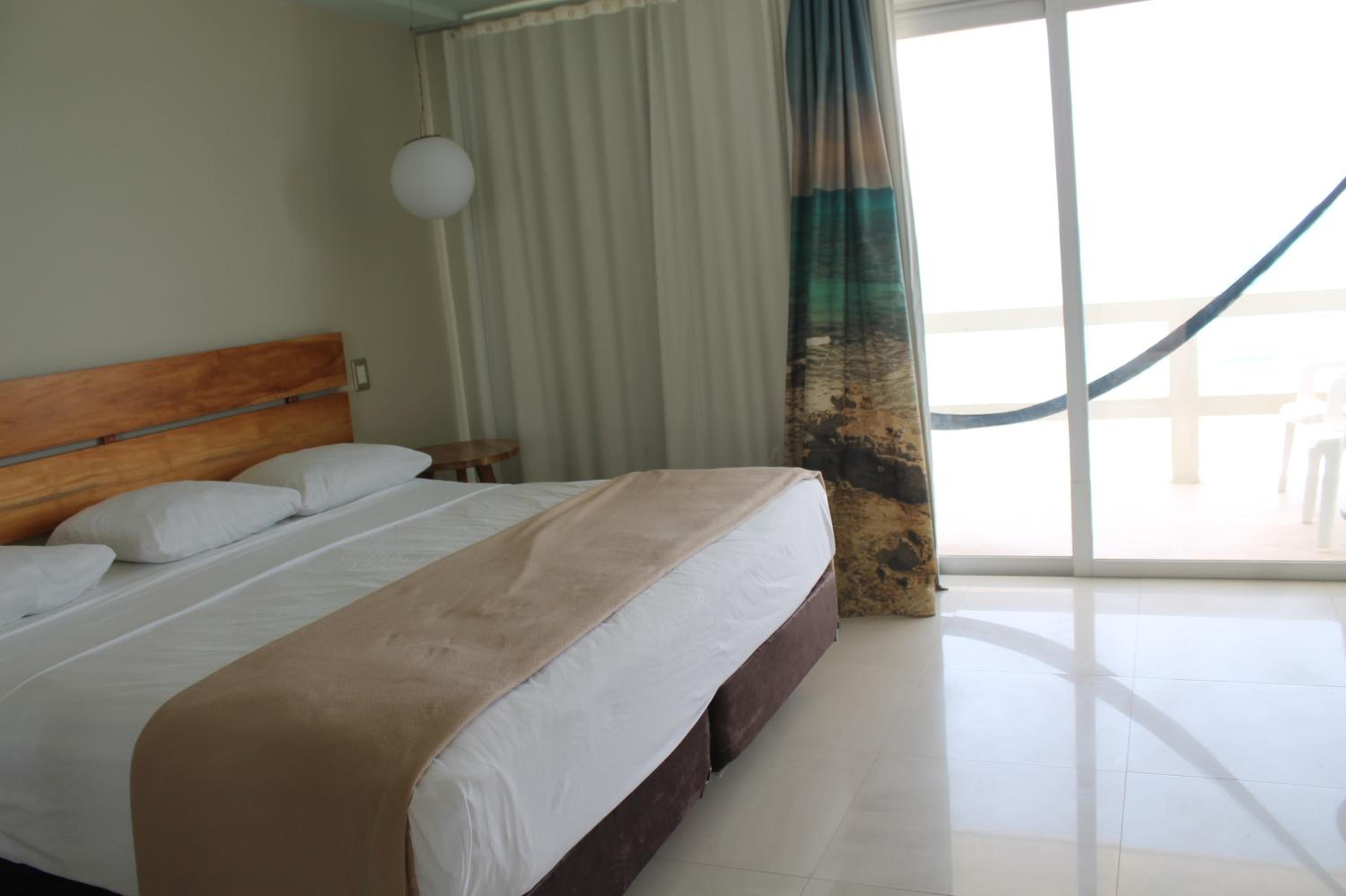 غرفة بسرير كينج بإطلالة على البحر، Hotel Rocamar Isla Mujeres 2/10