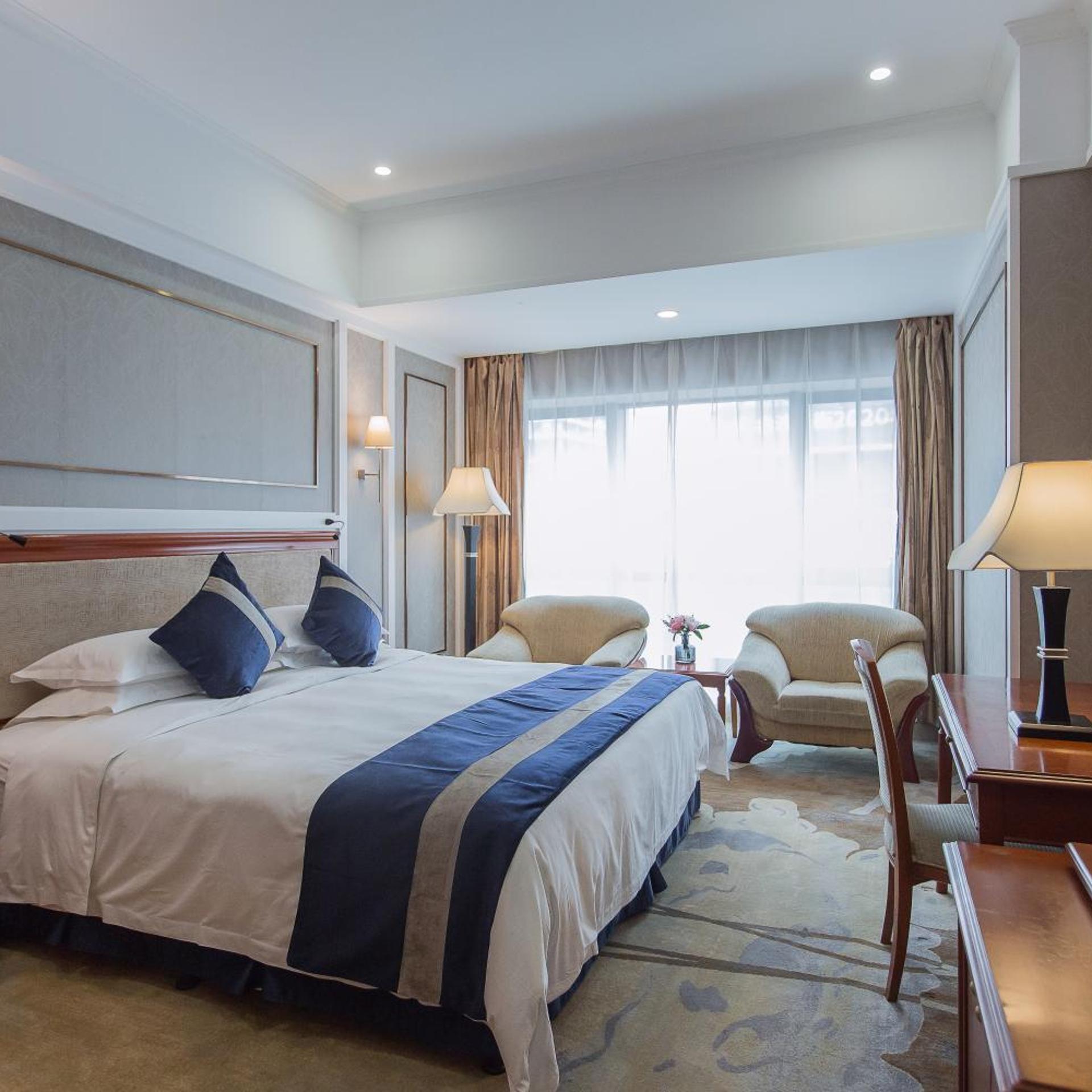 غرفة سوبيريور بسرير كينج بإطلالة على المدينة، Grand Metropark Hotel Liyuan Chongqing 1/5