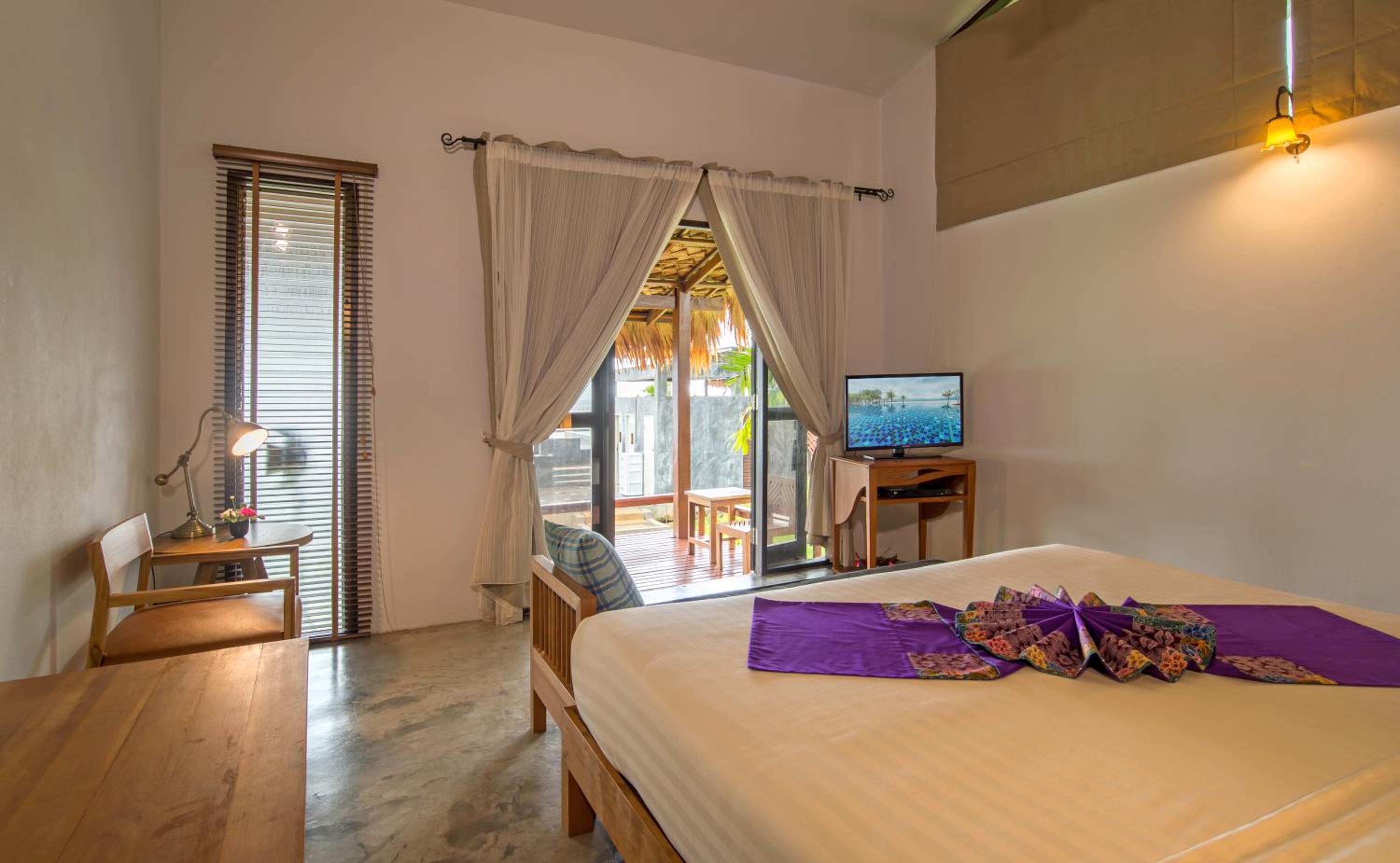 بنغل ثلاثي بسرير مزدوج بإطلالة على البحر مع أريكة، Islanda Hideaway Resort 2/5