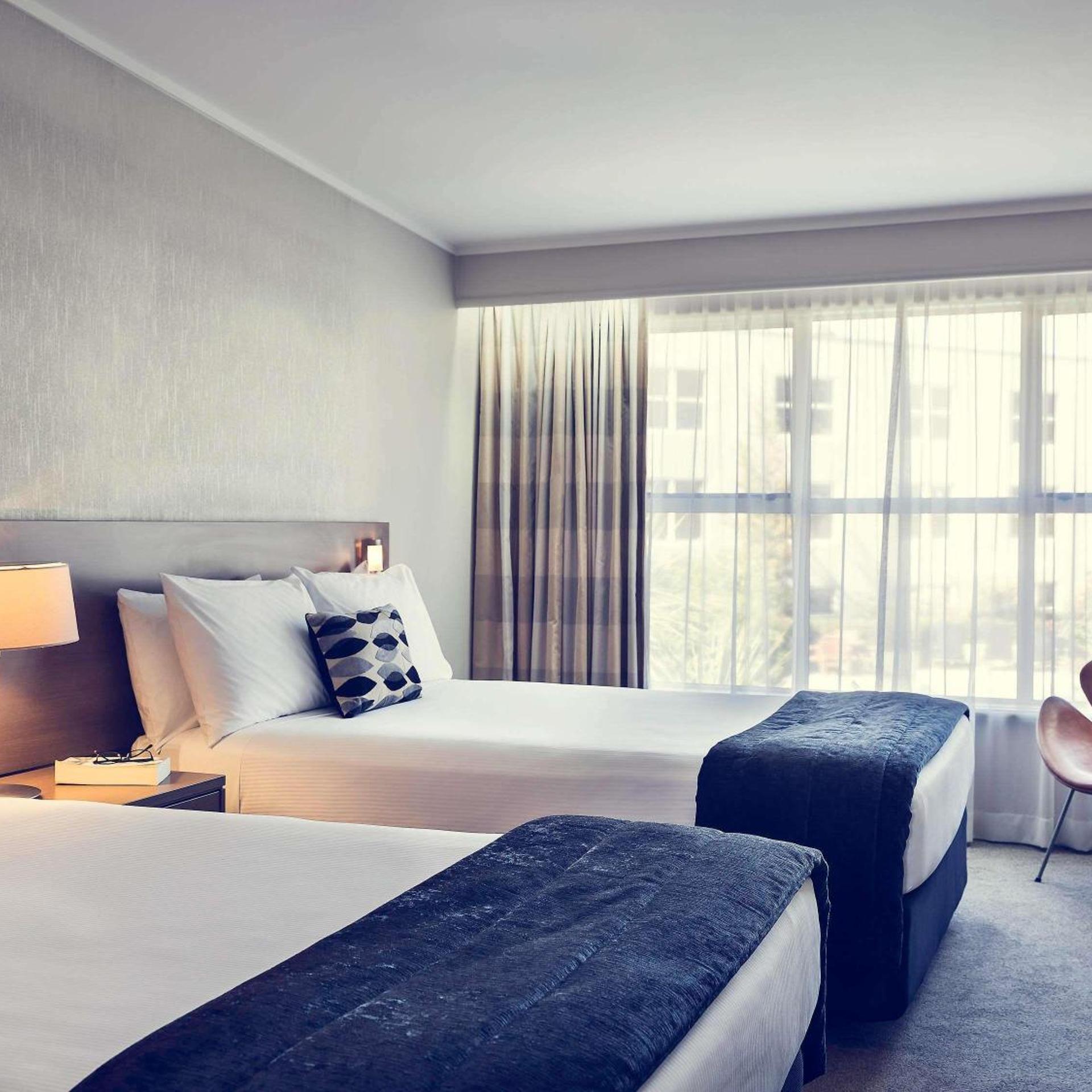 غرفة قياسية بسريرين مزدوجين بإطلالة على الحديقة، Movenpick Queenstown 3/4