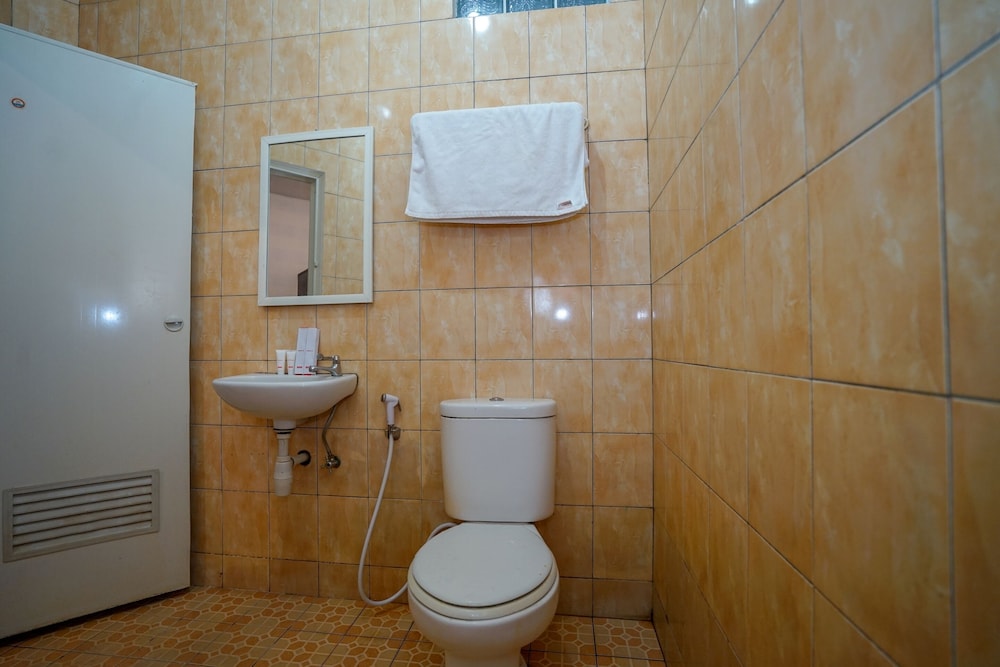 Super OYO 1844 Bravo Residence 39/39