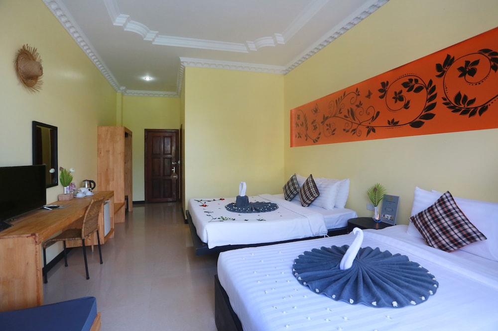 غرفة ديلوكس عائلية بسرير كينج وسرير فردي بشرفة، Central Indochine D Angkor Hotel 3/10