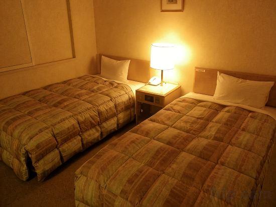 غرفة بسريرين منفصلين للمدخنين